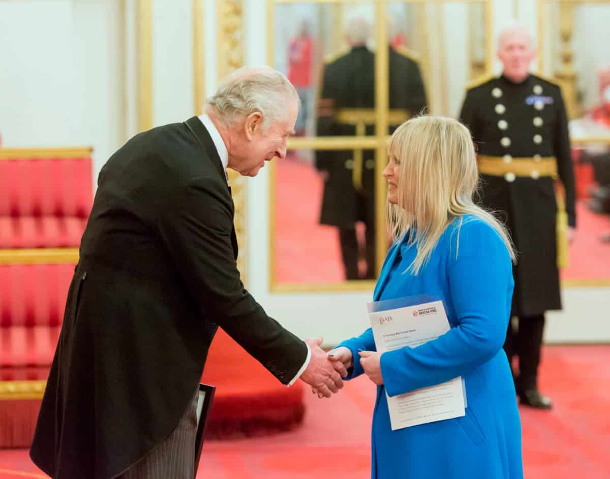 HM The King shaking hands with President Marie van der Zyl